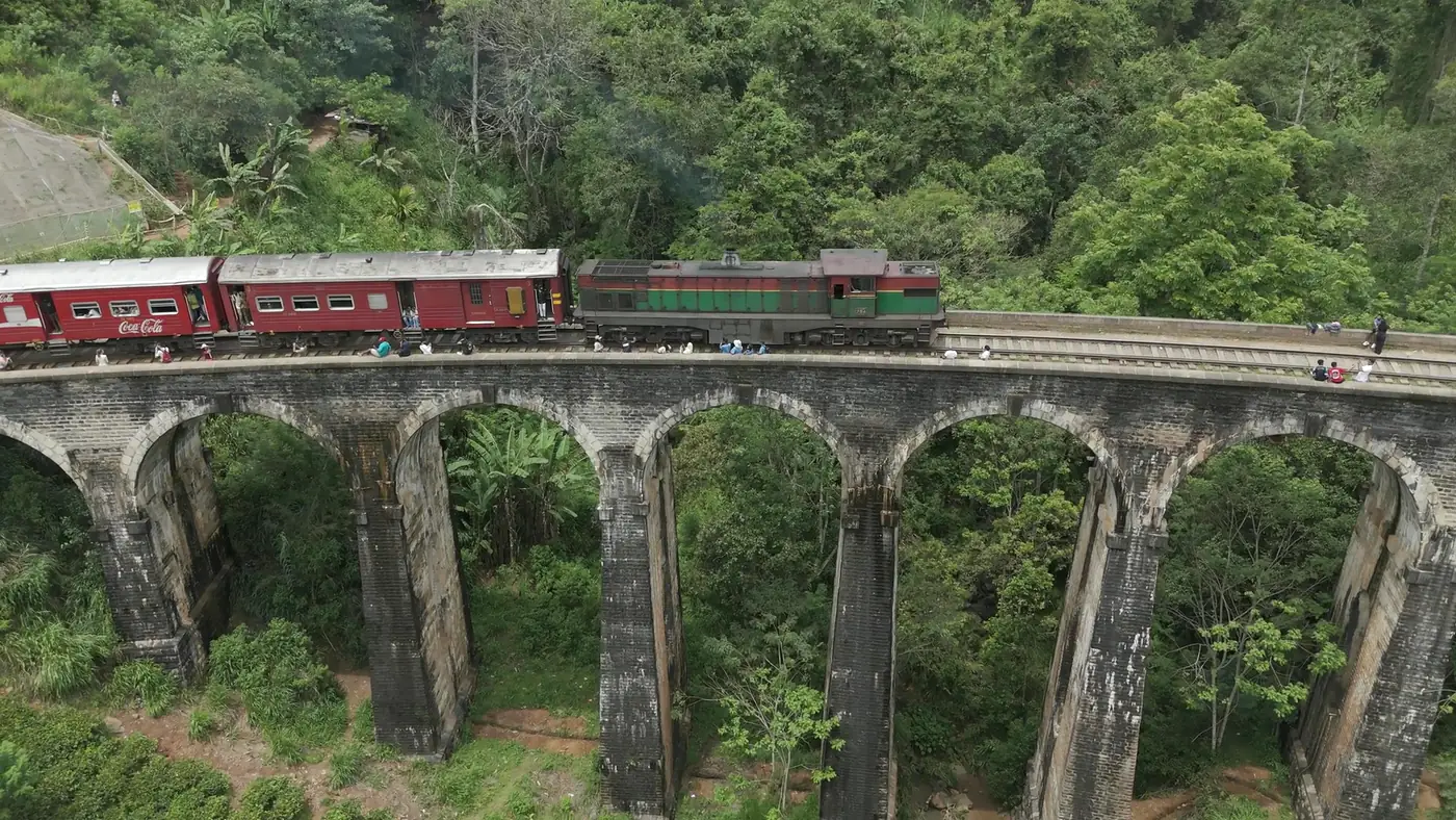 Train crossing the Nine Arches Bridge in Ella, Sri Lanka